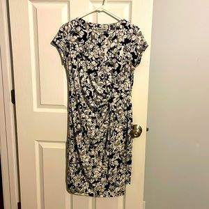 Black and white flower pattern dress.  Form fit but very flattering in stomach.